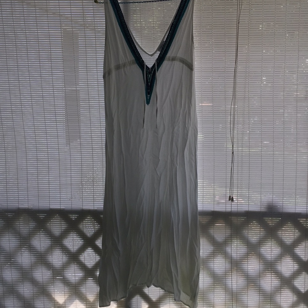 Size small blue& turquoise beaded v neck line